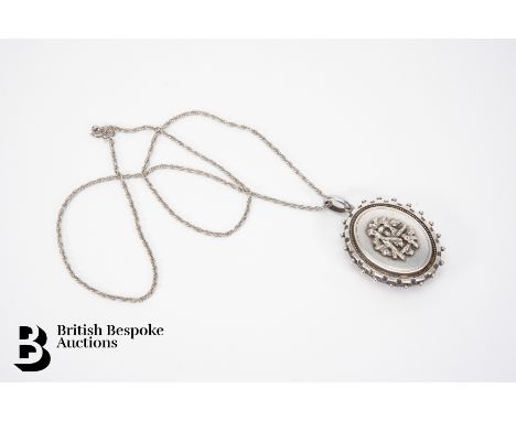 Victorian silver portrait medallion, with AEI amity eternity infinity motif, suspended from a fine silver chain, approx 26.1 