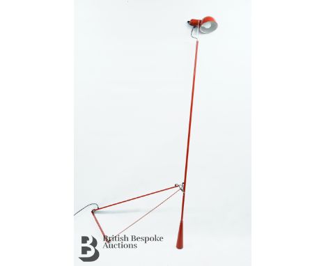 A extending light designed by Paolo Rizzatto for Arteluce, bright red finish, circa 1970-1979, marked behind the globed shade