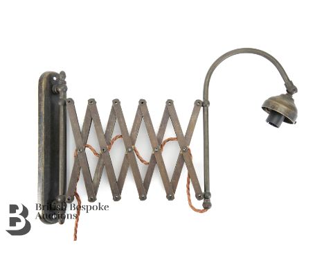 A vintage Italian Industrial concertina work light, with associated bulb, stamped Art 2700, approx 46 cms in length.&nbsp;