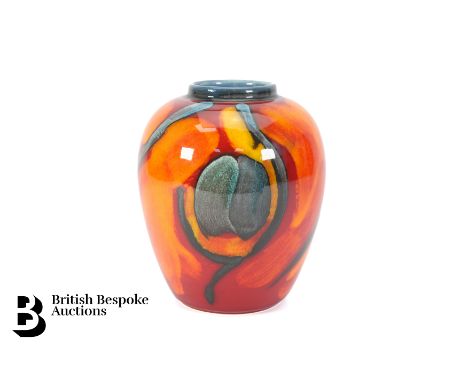 A mid-20th century Poole Pottery vase, approx 16 cms h, have red, yellow and turquoise blue glaze.&nbsp;&nbsp;