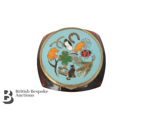 Vintage French turquoise blue enamel compact, decorated with Porte Bonheur imagery including elephant, swift, penguin, ladybi