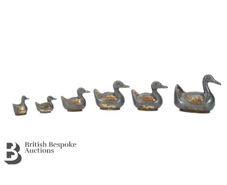 Set of graduated pewter duck trinket boxes, likely manufactured in Hong Kong.&nbsp;