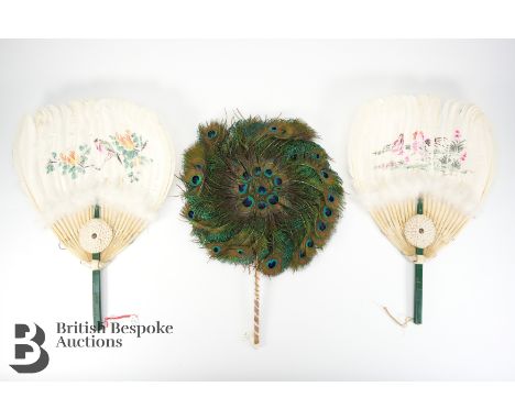 A circular Peacock feather fan on a bamboo stick handle approx 31 cms w x 44 cms h, early 1900's together with a pair of oval