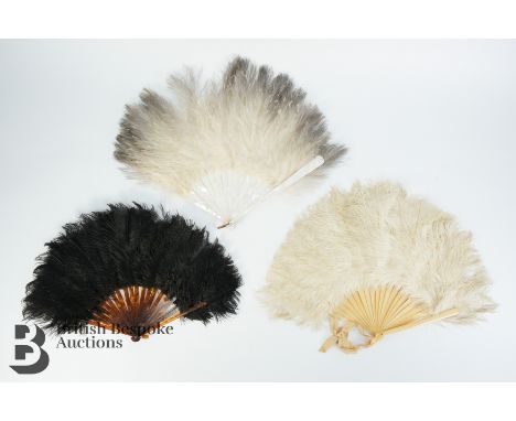 A black Ostrich feather fan with tortoiseshell monture guard stick, approx 15 cms and open approx 40 cms , one rivet broken, 