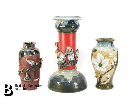 A large ceramic vase, with red and blue tones, decorated with figures in relief, approx 47 cms h; medium ceramic vase decorat