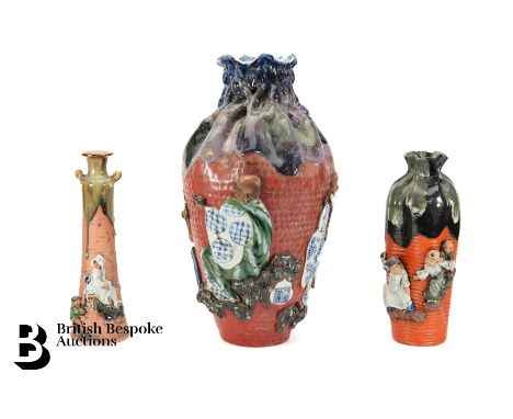 A large ceramic vase decorated with figures in a landscape with a tiger in relief, with a makers symbol, approx 60 cms h. Thi