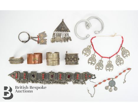 North African white metal accessories including a belt heightened with orange beads, approx 44 cms in length; Egyptian white 