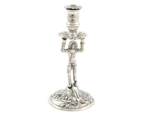 An 18th century silver Harlequin taper stick, the capital with maker's mark of W.D in a rectangular punch with a wavy-edge bo