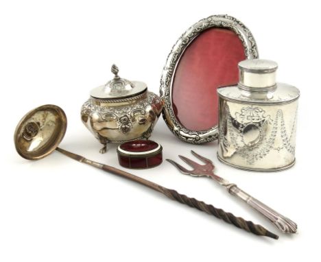 λA mixed lot of silver items, comprising: a late-Victorian tea caddy, by Carrington and Co, London 1897, of oval form, pull-o