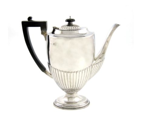 A Victorian silver coffee pot, by R. Pringle, London 1915, tapering oval form, part-fluted decoration, scroll handle, on a ra