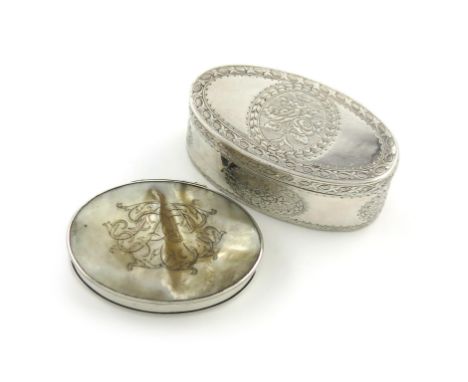 A late 18th century silver snuff box, unmarked, probably continental, oval form, engraved with flowers, gilded interior, leng