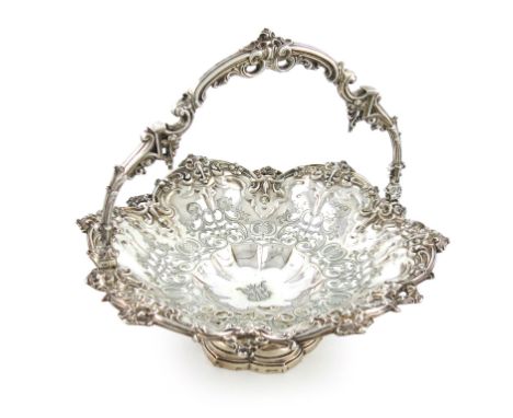 A Victorian silver swing-handled basket, by Henry Wilkinson, London 1863, shaped circular form, scroll borders, pierced and e