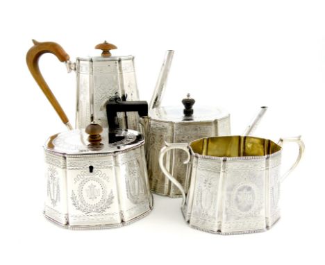 A matched four-piece Victorian silver tea and coffee set, by Henry Holland London 1878/79 and Aldewinckle and Slater, London 