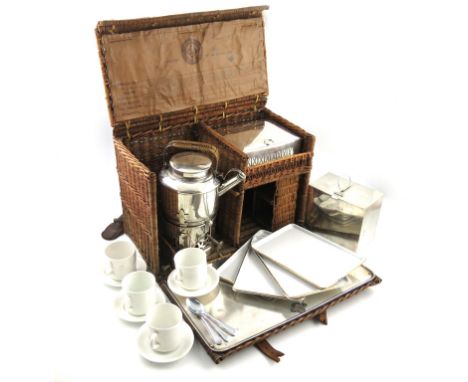 An Edwardian silver Drew's Patent and Registered "En Route" Picnic basket, the silver pieces with maker's mark of Drew and So