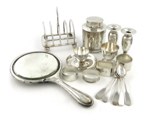 A mixed lot of silver items, comprising: a tea caddy, by Deakin & Francis Ltd, Birmingham 1910, circular form, with a pull-of
