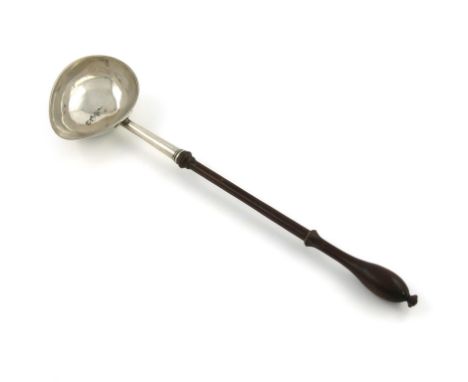 A George II silver punch ladle, by Richard Gosling, London 1752, shaped oval bowl, wooden baluster handle, length 30.3cm, app