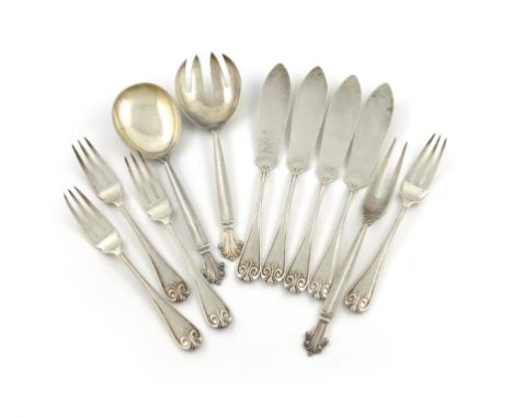 A mixed lot of silver flatware, comprising: a pair of Danish Acanthus pattern salad servers and serving fork, by Georg Jensen