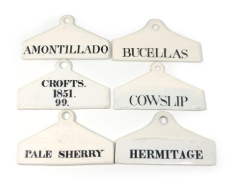 A collection of six early  19th century ceramic bin labels, some by Wedgwood, Minton and Farrow and Jackson, arched rectangul