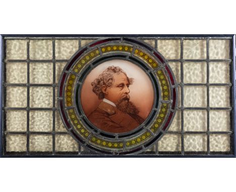 WINDOW PANEL. A Victorian painted and leaded glass rectangular window panel, the central roundel painted with a portrait bust