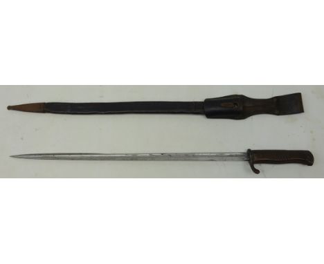 German Sword bayonet, 52cm fullered steel blade marked V.C Schlling, with ribbed wooden grip, in steel mounted scabbard with 