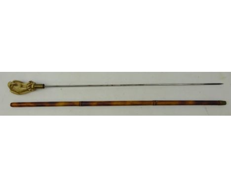 Bamboo swordstick, 67cm hexagonal stiletto blade, the handle moulded as an eagle, L89cm overall Condition Report Click here f