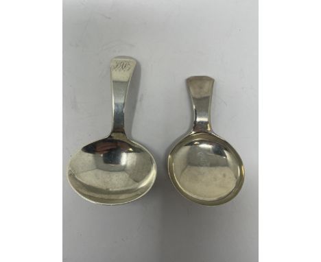 A George III silver caddy spoon, and another (2)