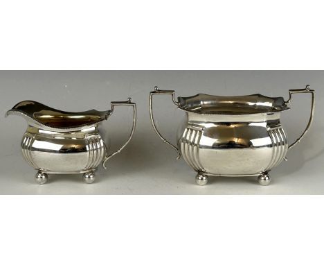 A George V silver sugar bowl, and a silver cream jug, Sheffield 1913, 15.1 ozt (2)