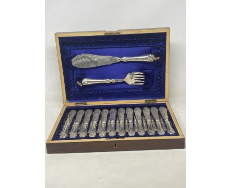 An Edward VII silver twelve piece fish set, Sheffield 1905, handles filled, cased