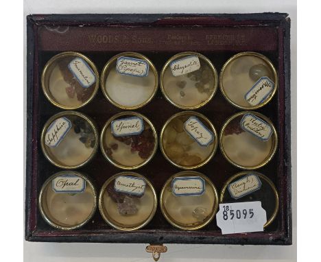 An unusual early 20th century cased set of uncut gems, retail mark for Woods &amp; Son