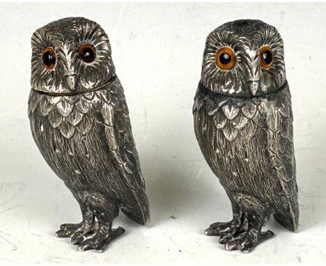 A pair of Elizabeth II silver novelty salt and peppers, in the form of owls, London 1958, 6.7 ozt Provenance: Sold on behalf 