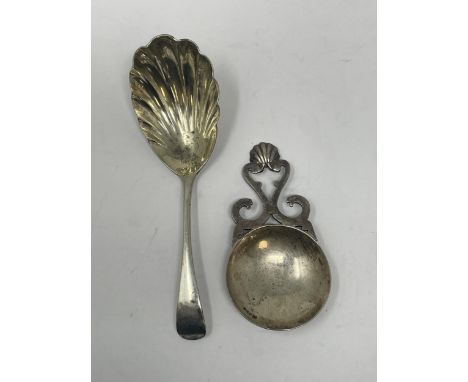 A George V silver caddy spoon, London 1923, and another (2)