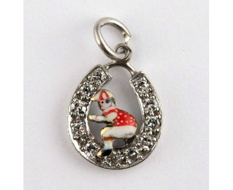 A platinum, diamond and enamel jockey pendant/charmweight 1g, 11 x 9 mm approx, no obvious faults to the naked eye