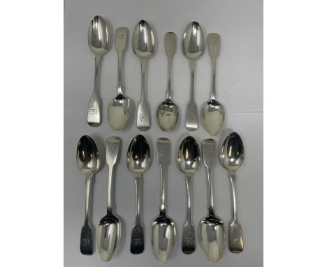 A set of twelve Irish Victorian fiddle pattern dessert spoons, W O Cohen, Dublin 1884, 9.24 ozt