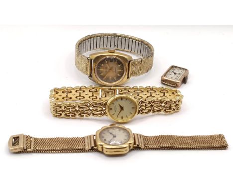 A ladies 9ct gold wristwatch, 23.4 g (all in), a ladies Rotary wristwatch, cased, another watch and a watch face (3)cushion c