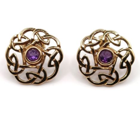 A pair of 9ct gold and amethyst Celtic style stud earringsAll in 3.1 g