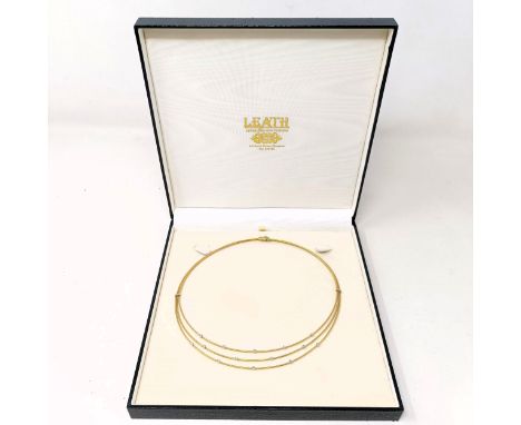 An 18ct gold and diamond necklace, 21 g