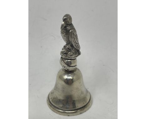 A Portuguese silver coloured metal bell, with a bird finial, 96 g