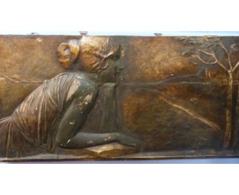 An unusual resin casting of a portrait of a lady looking onto landscape from a window, indistinctly signed, 19 x 36ins