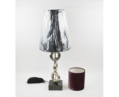 PORTA ROMANA TABLE LAMP, of three ring design on a stepped base with black Porta Romana fez shade and another Porta Romana ve