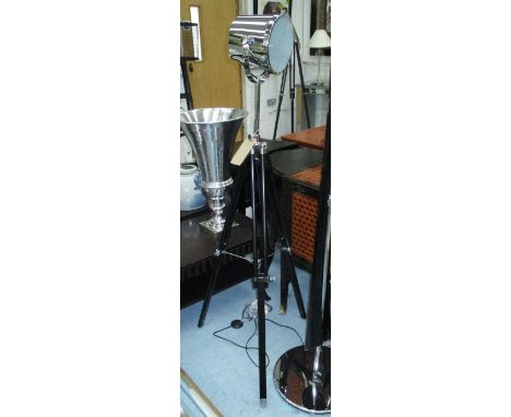 STUDIO LAMP, in chromed metal on extendable tripod support, 154cm H.