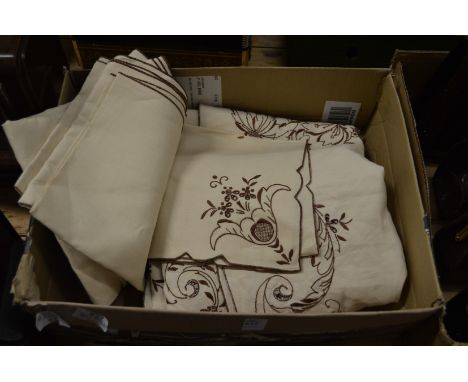 A tablecloth and napkins.