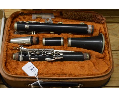 A cased clarinet.