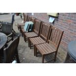 Six garden dining chairs with cushions.