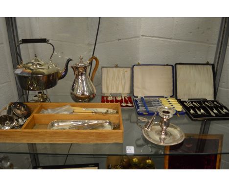 A quantity of plated ware to include kettle on stand, chamber stick etc.