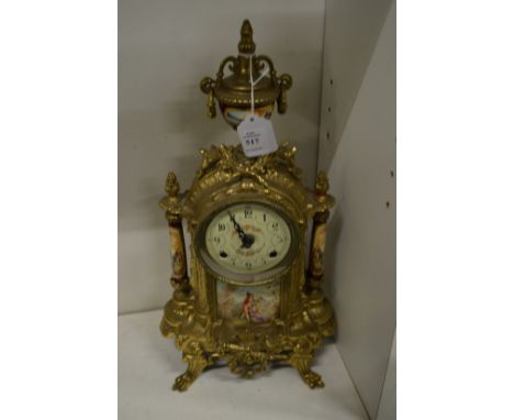 A modern ormolu mantle clock.