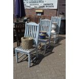 Three painted garden chairs.
