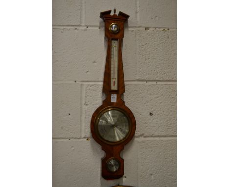 A modern barometer / thermometer.