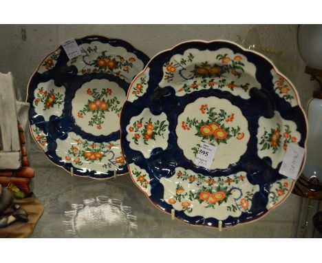 A pair of Chelsea Patch Mark porcelain soup bowls decorated with panels of flowers.