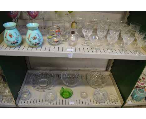 A quantity of glassware to include a pair of enamel decorated green opaque vases.
