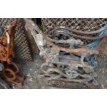 A pair of heavy cast iron bench ends.